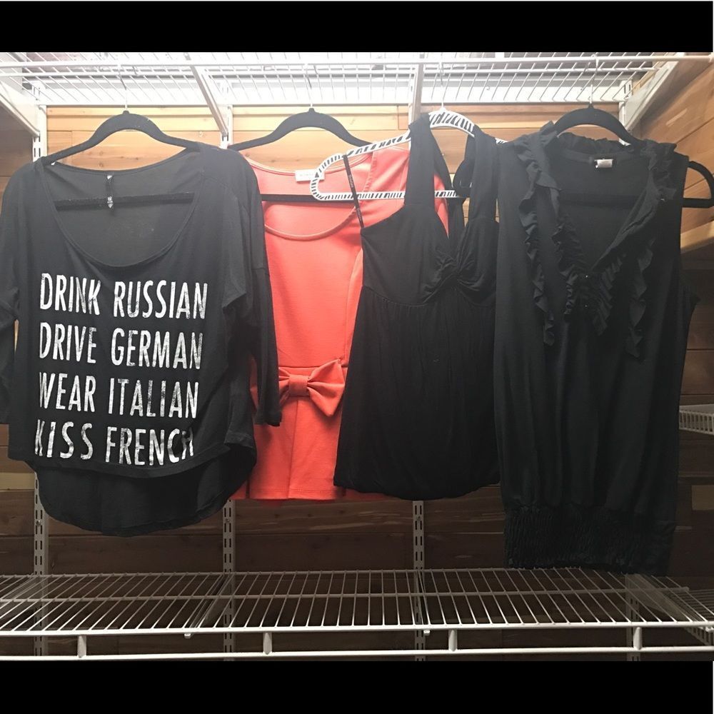 Four like-new shirts worn once or never‎